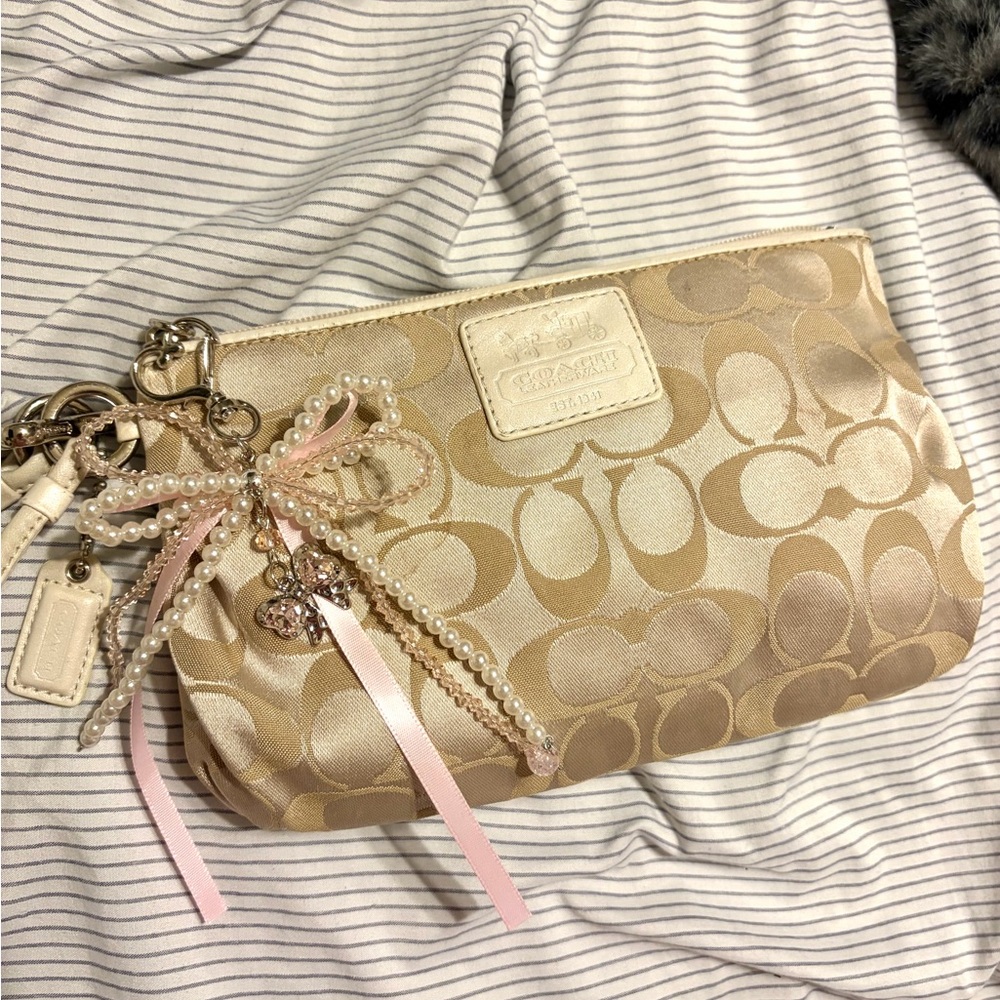 Coach Beige Wristlet with Pink Accents